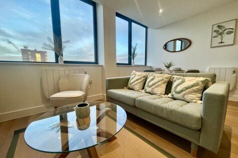 Available July! | Beautifully Presented Two-Bedroom Apartment | Fully Furnished to a High Standard | Spacious Open-Plan Living & Dining Area | Top Floor with Impressive City Views | Allocated Parking