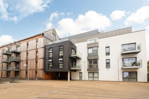 Modern top floor one bedroom apartment in Wapping Wharf with balcony, open plan living, secure lift access, good storage, and part furnished. Ideal for professionals or couples.