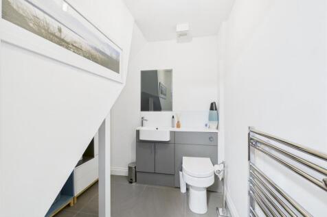 DOWNSTAIRS WC / CLOAKS