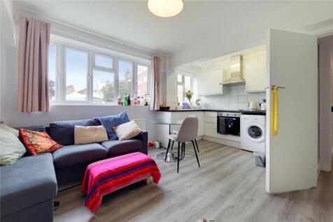 A well proportioned two bedroom, ground floor flat in a well maintained purpose built block on Acre Lane close to Clapham North and Brixton Underground stations. The property benefits from an open pla
