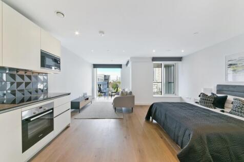 Modern studio apartment set within Hurlock Heights, Elephant Park SE17. Comprising a bespoke modern fitted kitchen with integrated appliances, a bright living / dining area with full height windows le