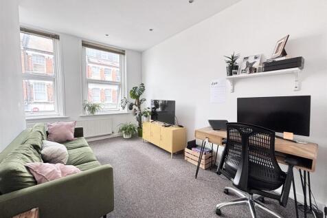 A well presented first floor flat above a shop premises is available to rent in Chamberlayne Road. The property will be redecorated once the current tenants vacate. The accommodation comprises: recept