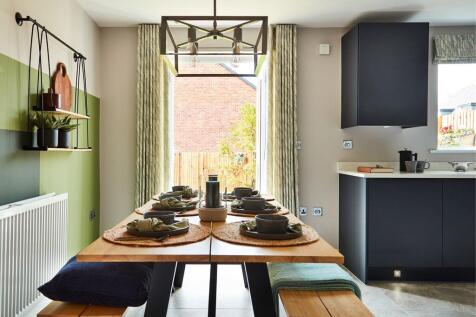 French doors keep the kitchen/diner light and airy