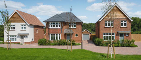 Redrow Paddock Green street scene of detached homes with single garages
