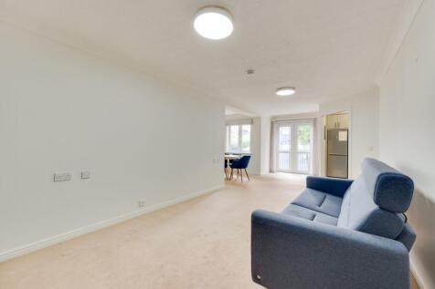 LARGER THAN AVERAGE SITTING AND DINING ROOM