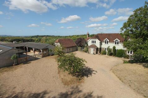 house, stables and view