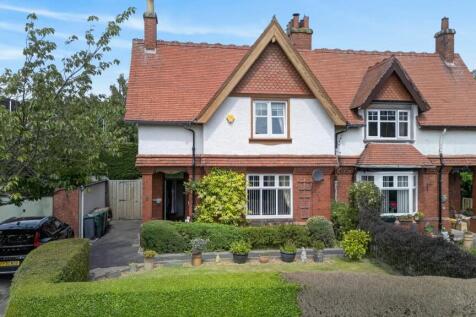 Formerly one of two Surgeon's Lodges serving the old City Hospital, and historically known as West Lodge, 115 Oxgangs Road North is a rarely available semi-detached Victorian house which occupies peac