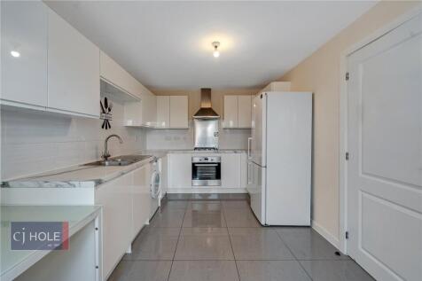 A four-bedroom, featuring a modern kitchen/diner with white goods, and a spacious living room with French doors opening onto the rear garden. The first floor offers two double bedrooms, a single bedro