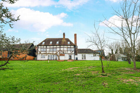 1389384-11-694000...