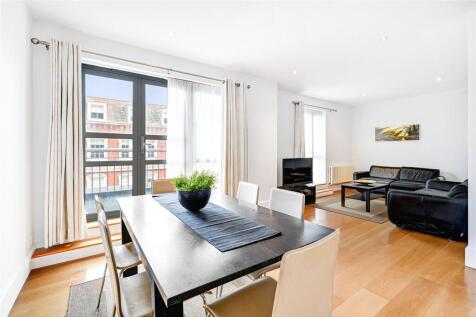 Impressive modern 2 bedroom, 2 bathroom split level apartment with garaged parking and 24/7 concierge.