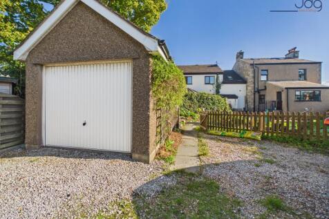 Long driveway and detached garage