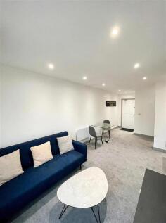 15_Living_Room_Long_View.jpg