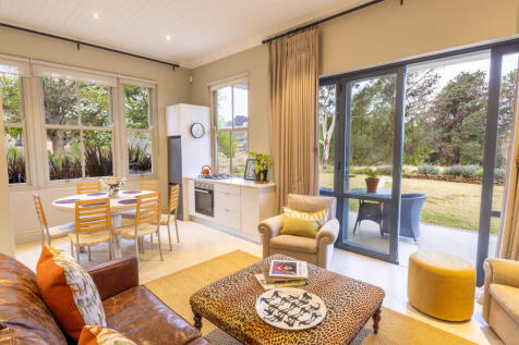 Open plan living room with patio