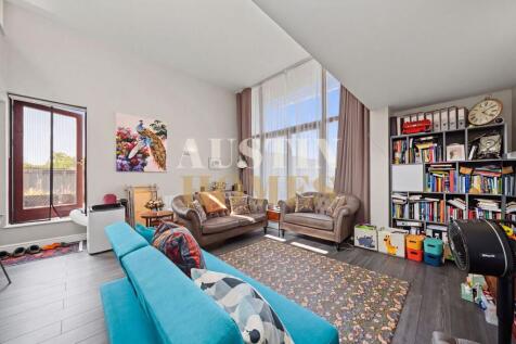 Experience the pinnacle of modern city living in this exceptional three-bedroom, two-bathroom apartment, offering a striking open-plan layout and sensational natural light throughout. Step outside to