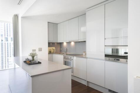Experience the elegance of modern design in this open and bright kitchen space.