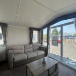 Bright Lounge With Sofa And Large Patio Doors