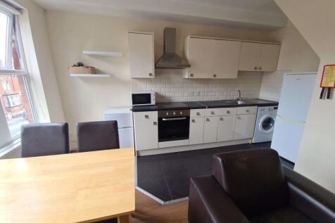 Bright and well-maintained kitchen featuring mo...