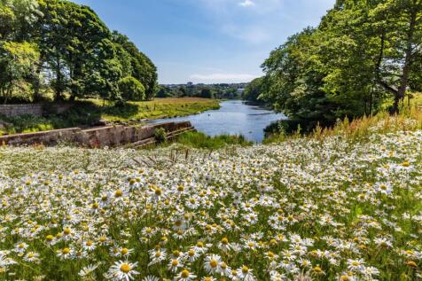 Country view of River Don and city of Aberdeen in background