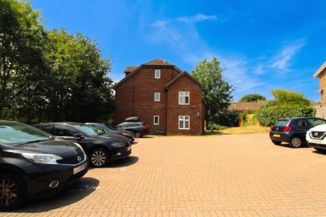 FRONT OF PROPERTY AND PARKING