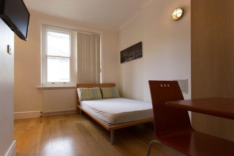 Open-plan single studio on West End Lane - Rent includes heating and water. Self contained with kitchenette, private bathroom, wood flooring. Located on the high street and very close transport links.