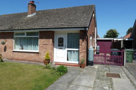 KAREN PARKS SALES & LETTINGS, ELBOW LANE, FORMBY are pleased to bring to market this well presented two bedroom semi-detached bungalow situated close to local amenities and Redgate Primary School. Acc