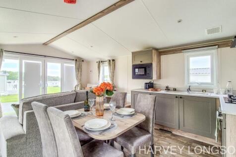 Open-plan living, kitchen and dining area in Wille
