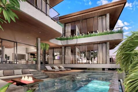 Modern luxury house with large glass windows, a po