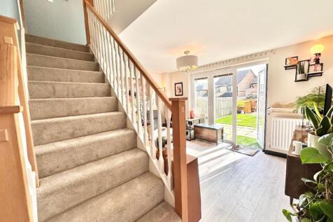 CENTRAL STAIRCASE LEADS TO