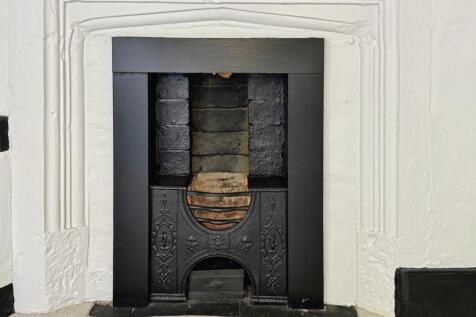 Bedroom One Fireplace.jpg