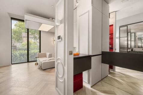 This wonderful apartment is overflowing with intelligent design features allowing you to transform your home throughout your day to work, relax and unwind.