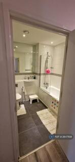 Bathroom With Large Mirror 