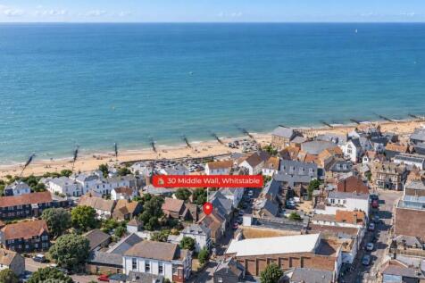 Aerial View of the Coastal Town and Beach_original