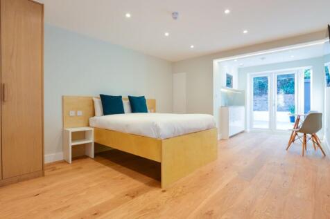 Modern studio in Queens Park - all bills included. Recently refurbished with double bed, en-suite, kitchenette, wooden floors & fitted storage. Just minutes from Queens Park Station, close to shops, c