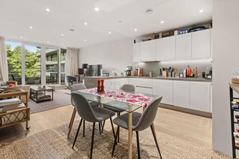 Immense 1,057sqft two bedroom, two and a half bathroom apartment in Sophora House with a large balcony overlooking Battersea Park.