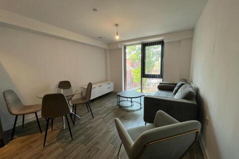 Available immediately. We are pleased to present this fully furnished two bedroom, two bathroom apartment with spacious living area, walking through to the modern kitchen with matt units and wood effe