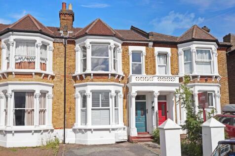 GUIDE PRICE £450,000 - £475,000 A beautifully presented two bedroom top floor flat on the highly sought after Kilmorie Road, offered with a share of the freehold. Recently renovated to a high standard