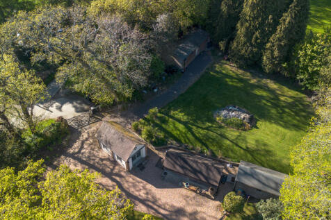 Aerial view of the four large outbuildings