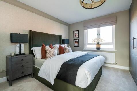 Relax and unwind in the main bedroom