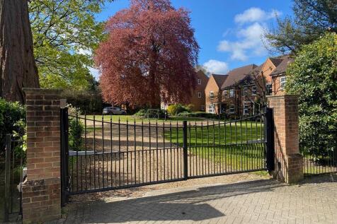 ELECTRIC GATES TO THE PRIVATE GARDENS...