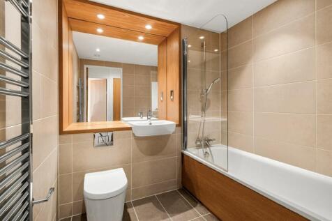 Experience luxury in every detail with this elegantly designed bathroom.