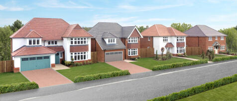 Modern detached houses with a mix of brickwork, white render, and varying roof tiles, set on a lands