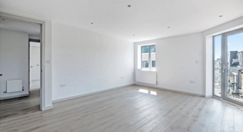 A fully refurbished two bedroom, two bathroom upper floor apartment with a private L shaped balcony.