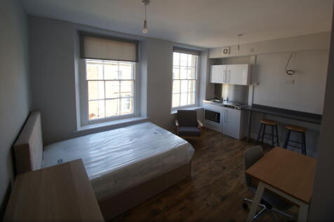 FURNISHED STUDIO - RENT INCLUDES WATER AND GAS. Shower room with electric shower. Main living area with kitchenette supplied with fridge, 2 ring electric hob and microwave oven. There is a breakfast b
