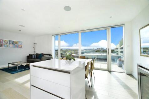 A stunning three double bedroom, two bath/shower room penthouse apartment in this prestigious development offering a fantastic open plan kitchen/reception with spacious balcony. It benefits from a con
