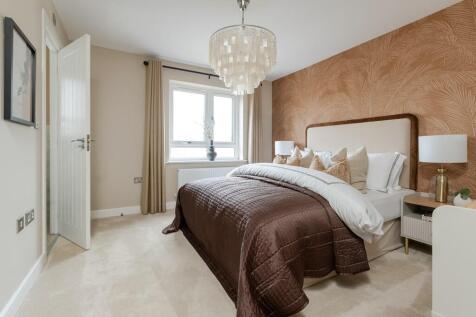 A generously sized bedroom 1