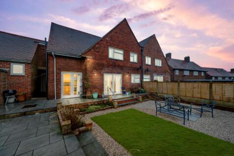 Dusk View Of The Rear Of The Property