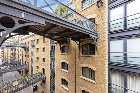 A large, newly redecorated warehouse apartment, with brand new carpets, on the 4th floor of Cardamom Building with a view over the gangways and cobbles of Shad Thames.