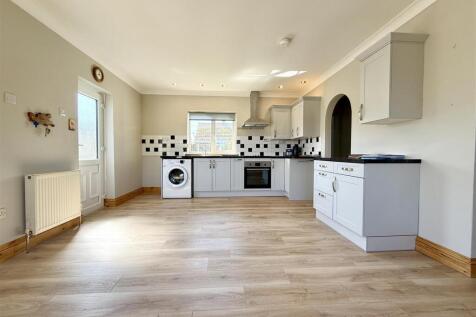 open plan kitchen dining living