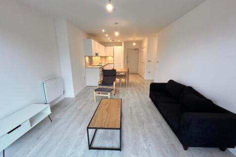 A modern two-bedroom apartment featuring a large private balcony, excellent transport connections, and comfortable contemporary living in West London.