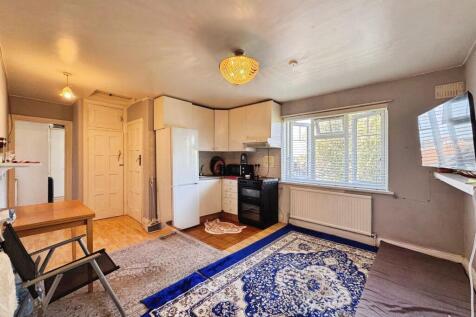 Reception/kitchen/dining area